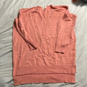 Women’s peach/coral v neck sweater